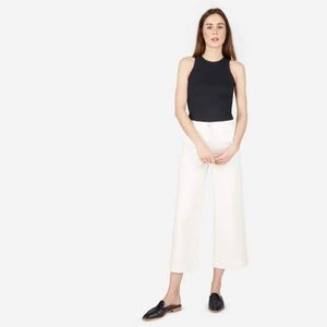 Everlane wide leg cropped pants in white.